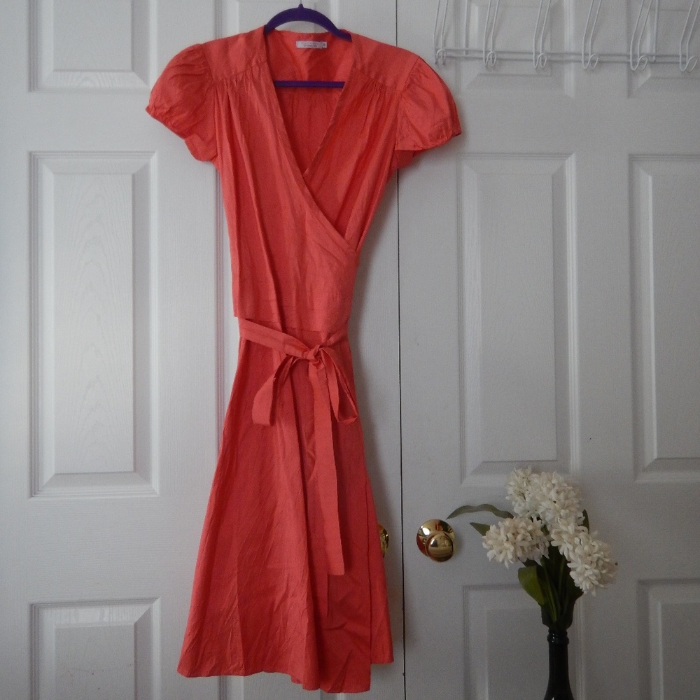 Calypso salmon-pink wrap dress
